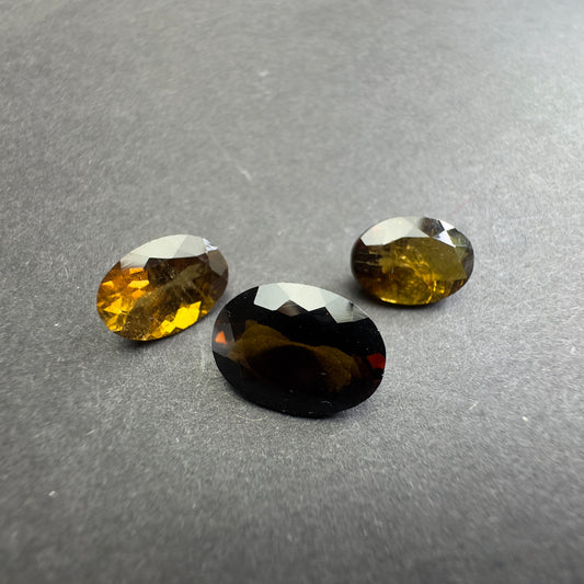 Irresistible Allure of our Intense Dark Oval Faceted Tourmaline