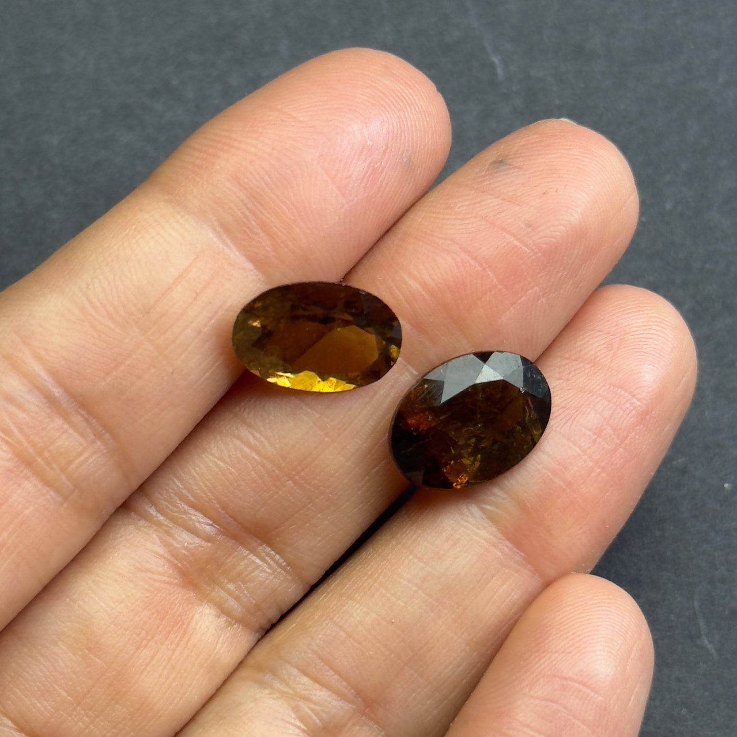 Irresistible Allure of our Intense Dark Oval Faceted Tourmaline