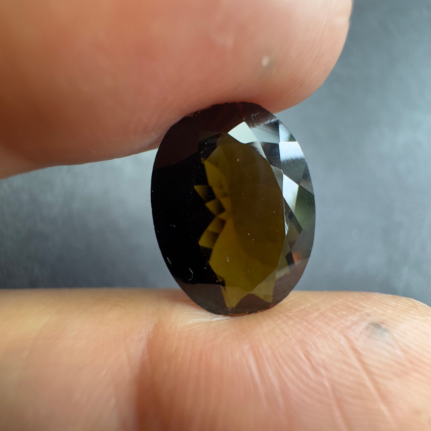 Irresistible Allure of our Intense Dark Oval Faceted Tourmaline