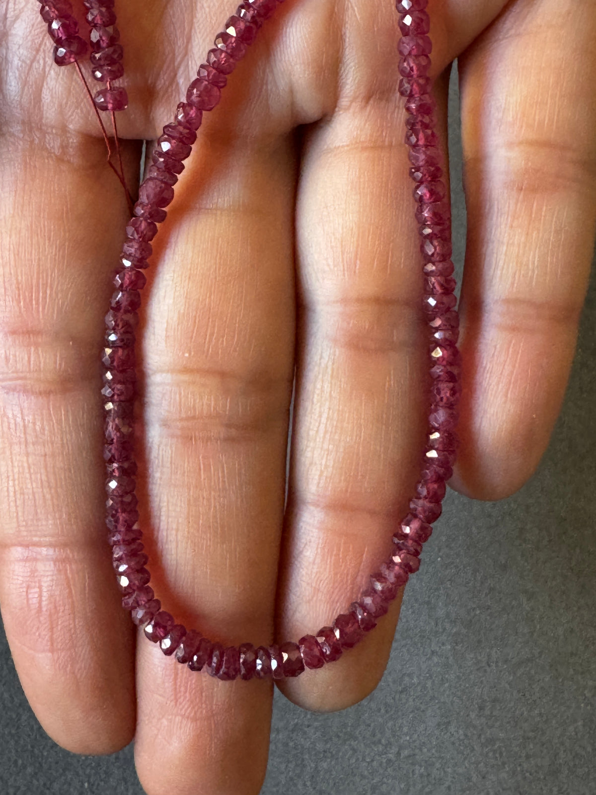 Natural Ruby Faceted Bead Strand 63.12cts – Dark Pink – 42cm