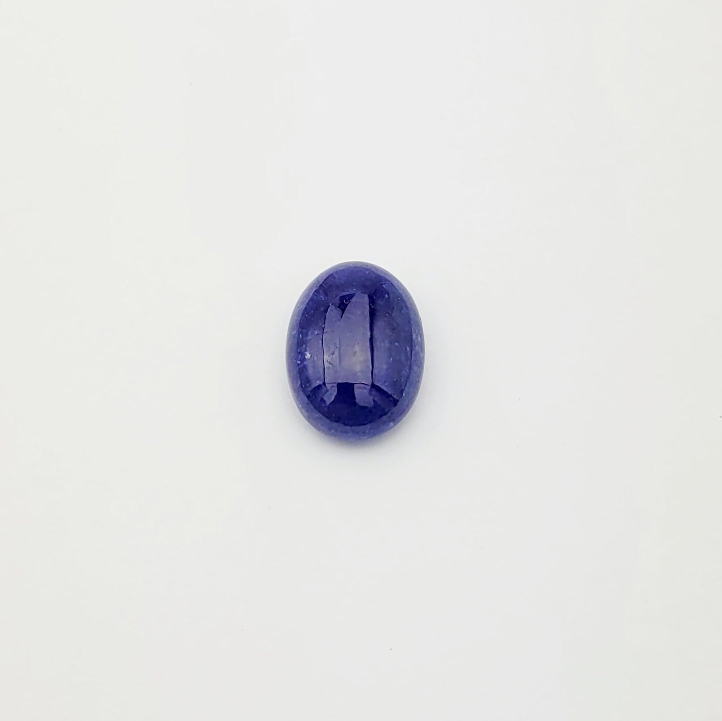 Tansanit Cabochon durchscheinend mit schönen Einschlüssen blau