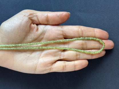 Blue Peridot Rondelle Beads, 39.59 ct, 2.8-3.9 mm, 44 cm – view 1 of 2