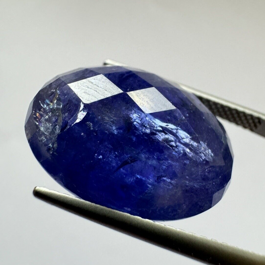 Ink blue Tanzanite oval Cabochon Faceted 19,3mm x 14,2mm 20,75cts