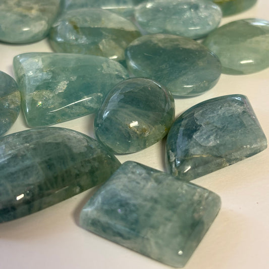 10 Pieces Polished Blue Greenish Aquamarine With Inclusions In Various Shapes