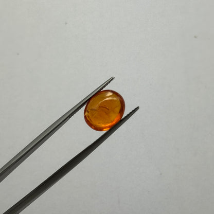 Orange Garnet Oval Cabochon, 7.20 ct, 12x10 mm – view 1 of 4