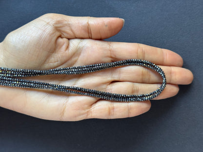 Grey Hematite Round Faceted Beads, 2.30-2.47 mm – view 1 of 2