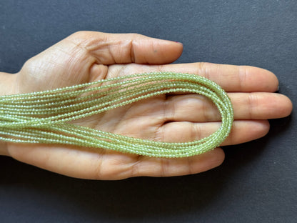 Green Peridot Round Faceted Beads, 290.90 ct, 42 cm – view 1 of 3