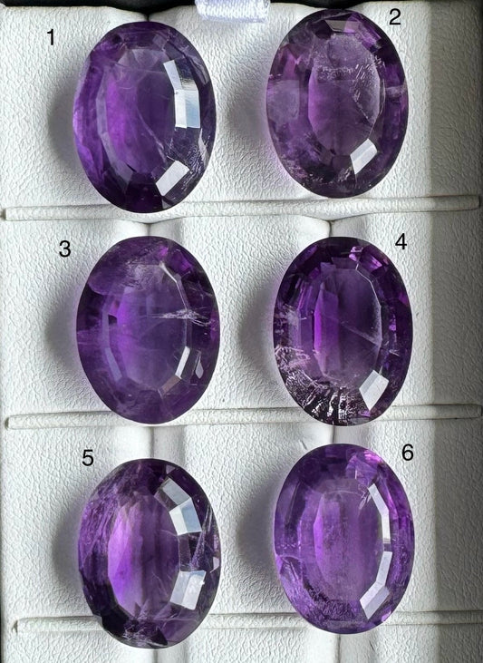 Amethyst Oval Faceted Gemstones With Deep Purple And Inclusions