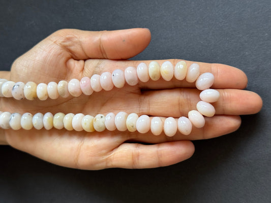 Zarte rosa Opal-Rondelle-Perlen mit glatter, glänzender Oberfläche, 302,05 Karat