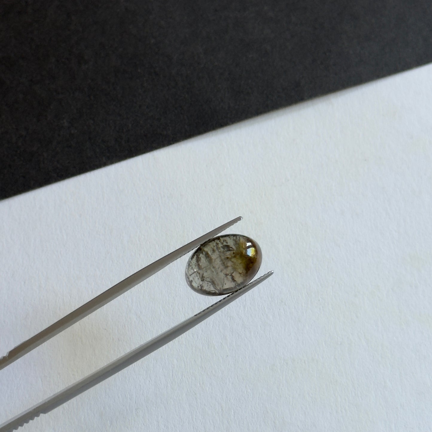 Olive Green Tourmaline Full of Light Oval Shape with Inclusions 7.92cts
