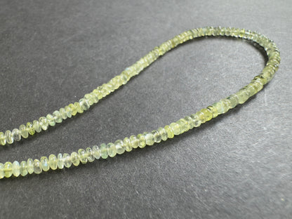 Green Peridot Rondelle Beads, 71.66 ct, 2.57-2.80 mm, 40 cm – view 1 of 2