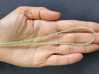 Green Peridot Rondelle Beads, 71.66 ct, 2.57-2.80 mm, 40 cm – view 2 of 2