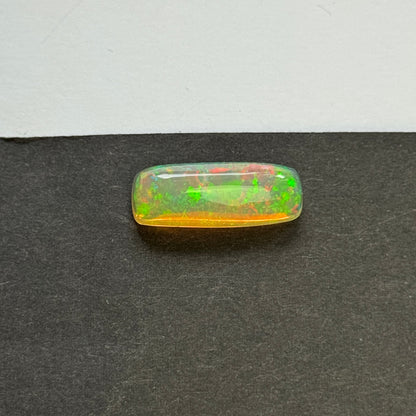 Yellow Opal Rectangular Cabochon, 9.15 ct, 24.1x9.4 mm – view 4 of 5