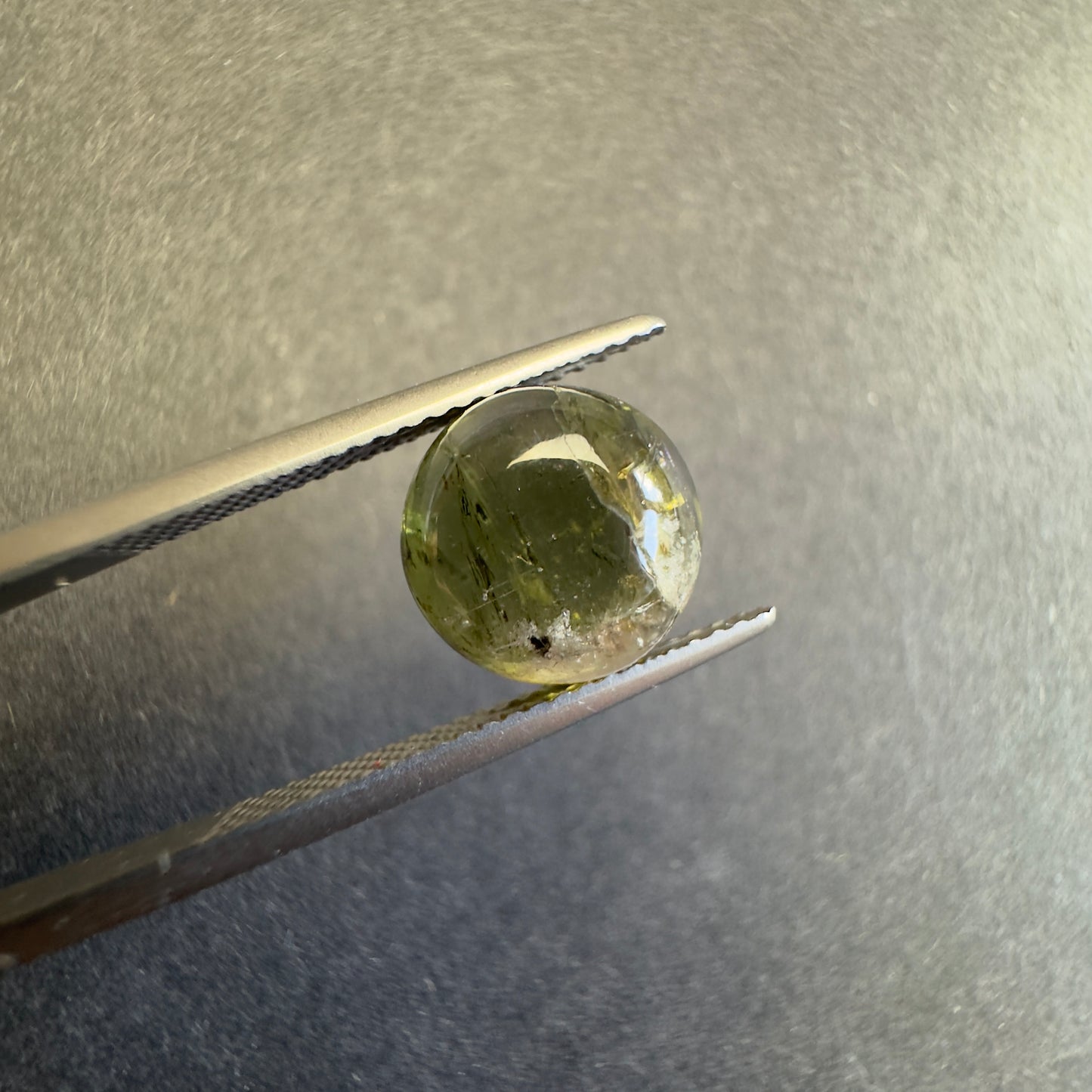Beautiful forest green hues that capture light with natural elegance ! 10mm Tourmaline