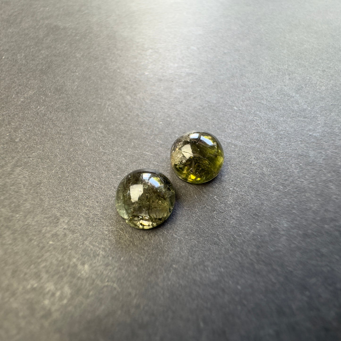 Beautiful forest green hues that capture light with natural elegance ! 10mm Tourmaline