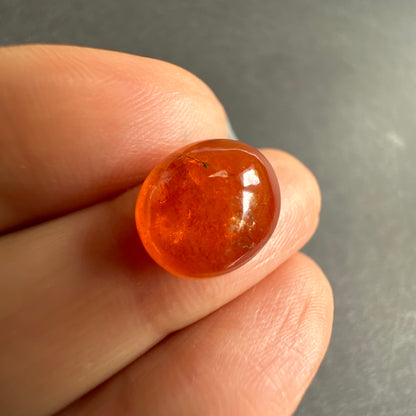 Orange Garnet Oval Cabochon, 7.4 ct, 12x10 mm – view 3 of 3