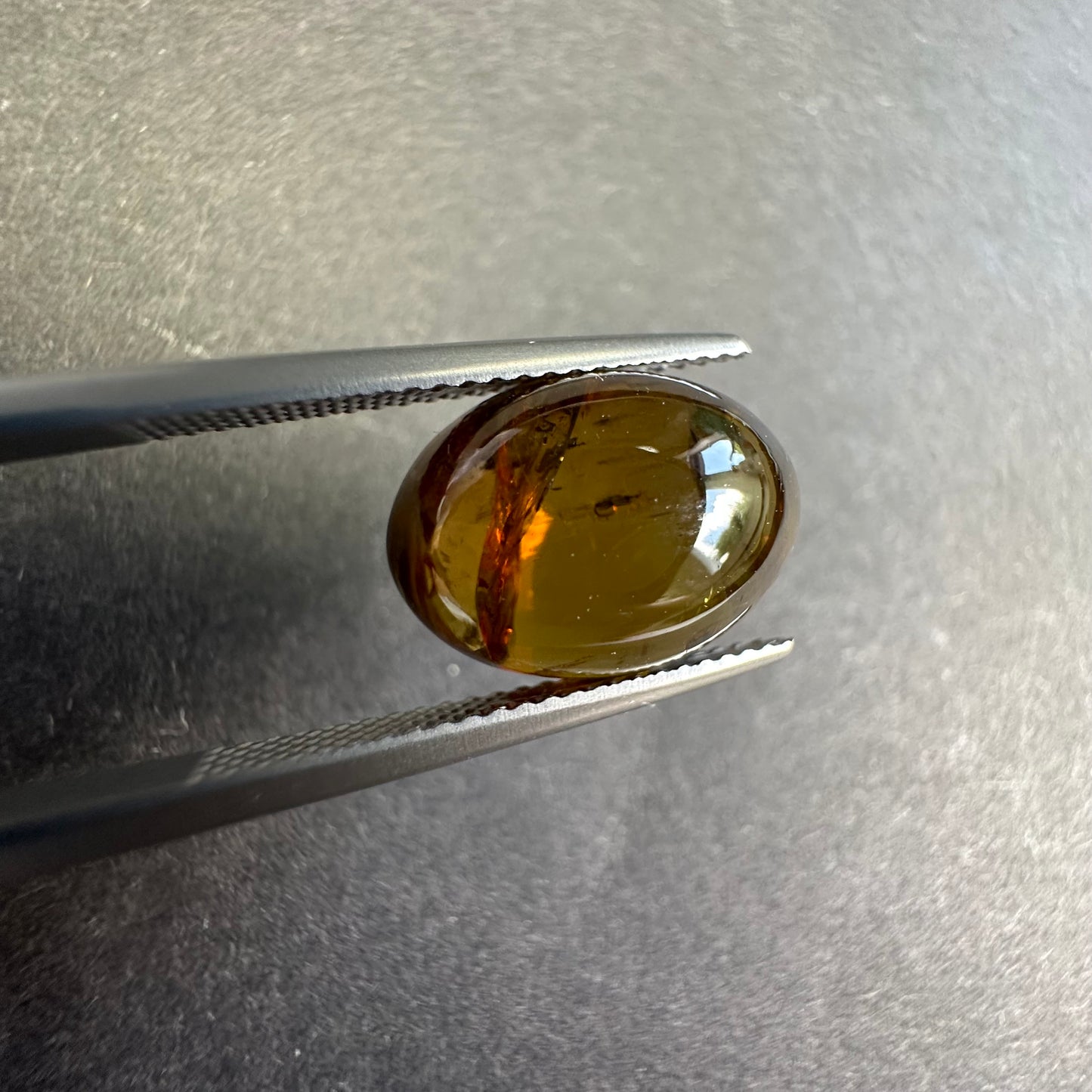 Tourmaline -  Transitions beautifully from olive green to golden orange  -7,95cts