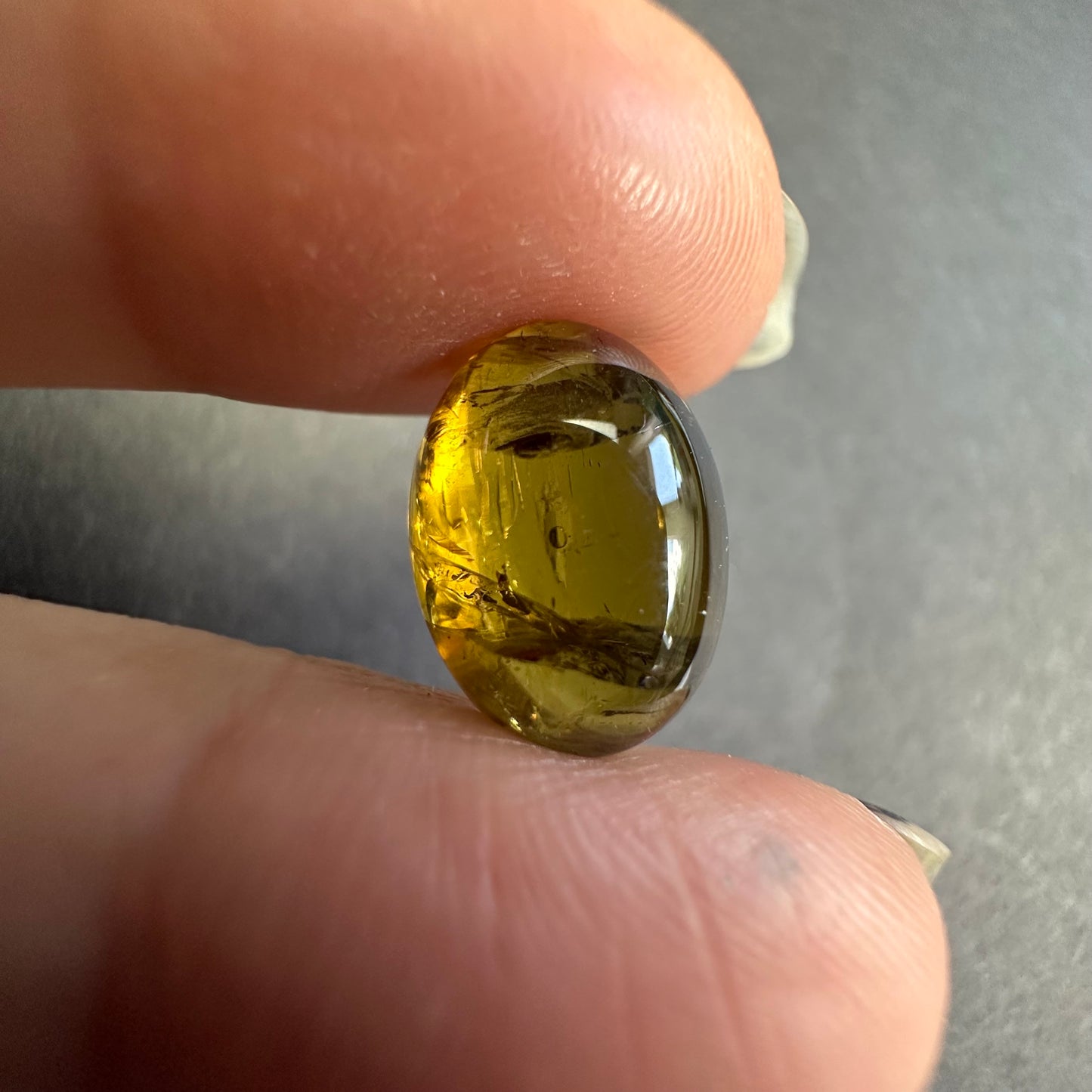 Tourmaline -  Transitions beautifully from olive green to golden orange  -7,95cts