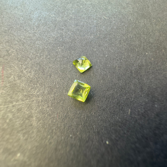 Peridot pair, square cabochons, approx. 4.0x3.9mm & 3.8x3.7mm, 0.60cts