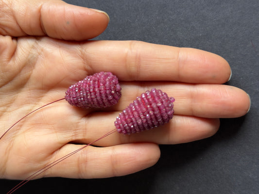 Ruby  Beautifully Accented by Luminous Pearls Arranged in a Delicate Floral Design.