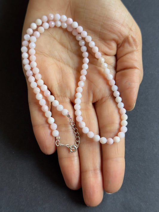 Mesmerizing Beauty of our Faceted Pink Opal Round Beads -47,77cts