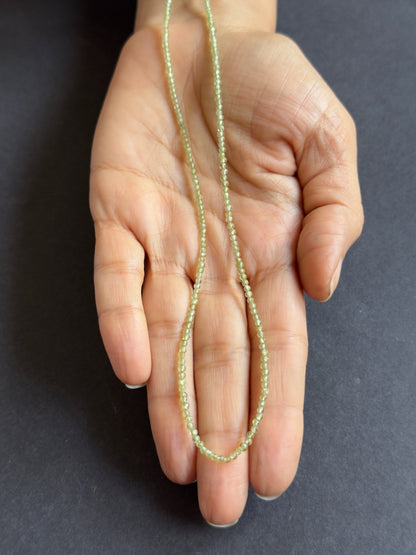 Green Peridot Round Faceted Beads, 16.85 ct, 2.2-2.3 mm, 41 cm – view 1 of 2