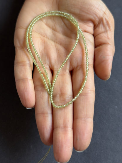 Green Peridot Round Faceted Beads, 16.85 ct, 2.2-2.3 mm, 41 cm – view 2 of 2