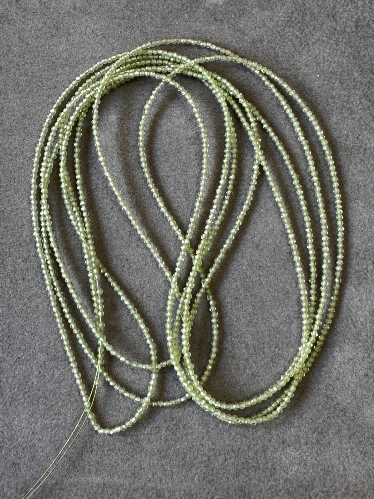 Natural Peridot Faceted Bead Strand 54.35cts – Green – Transparent – 200cm