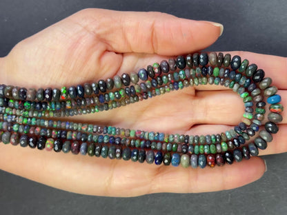 Strang aus schwarzen Opal-Rondellen, 42 cm